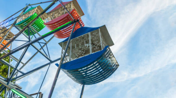 Ferris wheel with sky blue